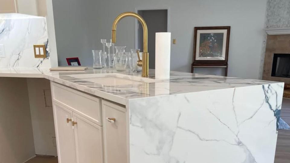 Completed kitchen remodel in Brandon, FL with new cabinets, countertops, and kitchen island